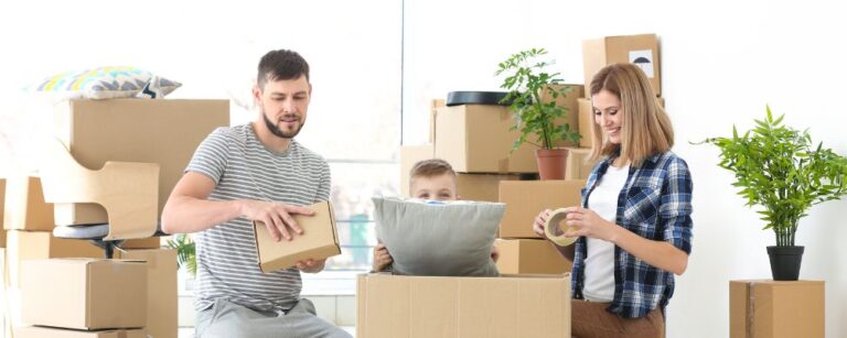 Family packing their items into boxes